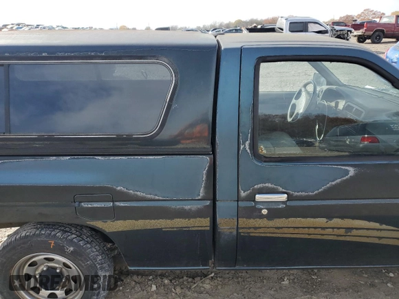 1994 Nissan Frontier with VIN 1N6SD11S4RC405080, listed as a Copart auction lot 82565904 with 154,400 mi miles and Salvage title. Bid and sale history available at DreamBid. Image 10.
