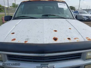 1997 Chevrolet Tahoe with VIN 1GNEK13R3VJ416827, listed as a IAAI auction lot 42041780 with 143,566 mi miles. Bid and sale history available at carsss.com. Image 6.