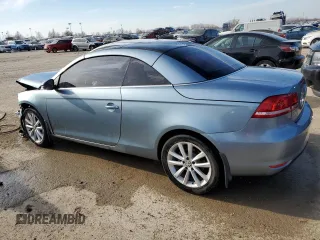 2015 Volkswagen Eos Komfort with VIN WVWBW8AH2FV000829, listed as a Copart auction lot 43082344 with 68,099 mi miles and Salvage Title. Bid and sale history available at DreamBid. Image 2.