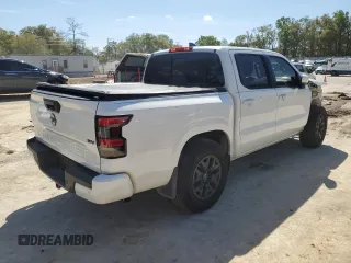 2023 Nissan Frontier Pro-X with VIN 1N6ED1EJ1PN672564, listed as a Copart auction lot 49304865 with 13,575 mi miles and Salvage title. Bid and sale history available at DreamBid. Image 3.