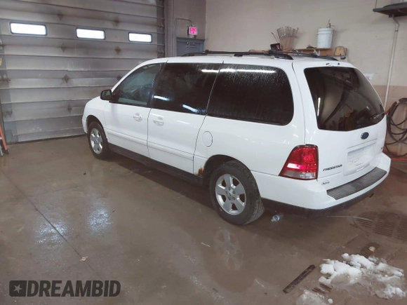 2005 Ford Freestar SES с VIN 2FMZA57695BA87443, выставлен на аукционе IAAI как лот 40873184 с пробегом 144 558 миль миль и . История ставок и продаж доступна на DreamBid. Изображение 3.