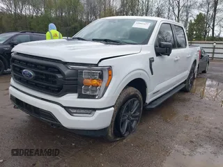 2023 Ford F-150 XL with VIN 1FTFW1ED8PFD06493, listed as a IAAI auction lot 42002427 with 31,147 mi miles and . Bid and sale history available at carsss.com. Image 2.