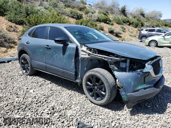 2023 Mazda CX-30 S Carbon Edition with VIN 3MVDMBCM1PM524019, listed as a Copart auction lot 57079355 with 46,737 mi miles and Salvage title. Bid and sale history available at DreamBid. Image 4.