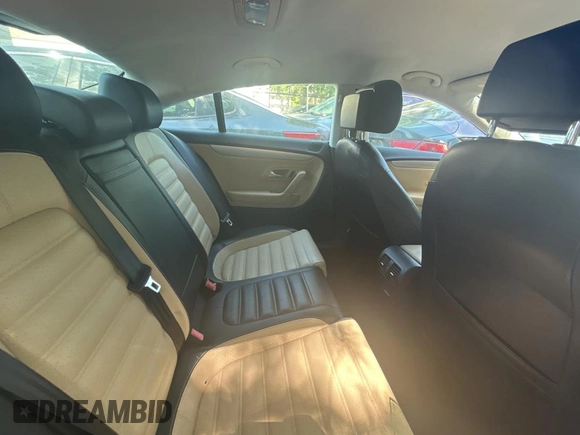 2013 Volkswagen CC Sport with VIN WVWBP7AN3DE504851, listed as a Copart auction lot 54958815 with 104,533 mi miles and Salvage Title. Bid and sale history available at carsss.com. Image 6.