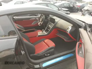 2024 BMW 8 Series M850i xDrive with VIN WBABC4C01RCR35247, listed as a IAAI auction lot 41266501 with 2,416 mi miles. Bid and sale history available at carsss.com. Image 5.