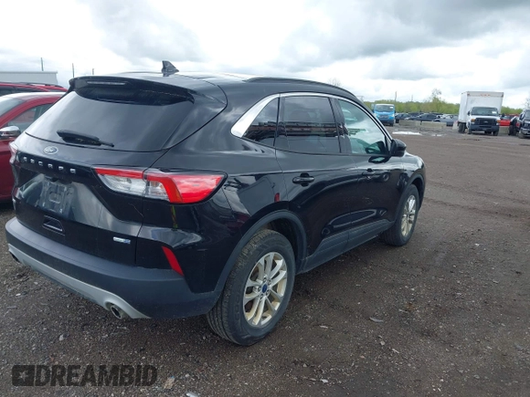 2020 Ford Escape SE with VIN 1FMCU9G69LUA09014, listed as a IAAI auction lot 42208056 with 135,334 mi miles and . Bid and sale history available at DreamBid. Image 4.