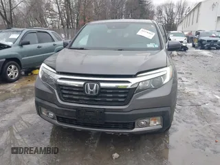 2020 Honda Ridgeline RTL-E with VIN 5FPYK3F70LB015422, listed as a IAAI auction lot 41578369 with 78,860 mi miles and . Bid and sale history available at DreamBid. Image 12.