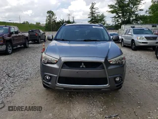 2011 Mitsubishi Outlander SE z VIN JA4AP4AU7BZ013457, wystawiony jako Copart lot #58860505 z przebiegiem 221 993 mil mil oraz Szkoda całkowita • Salvage title. Historia ofert i sprzedaży dostępna na DreamBid. Obrazek 5.