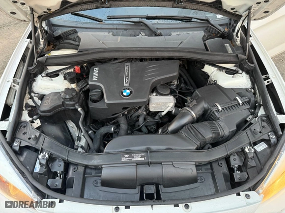 2013 BMW X1 28i with VIN WBAVM1C54DVW42766, listed as a Copart auction lot 54416745 with 121,067 mi miles and Clean Title. Bid and sale history available at carsss.com. Image 7.