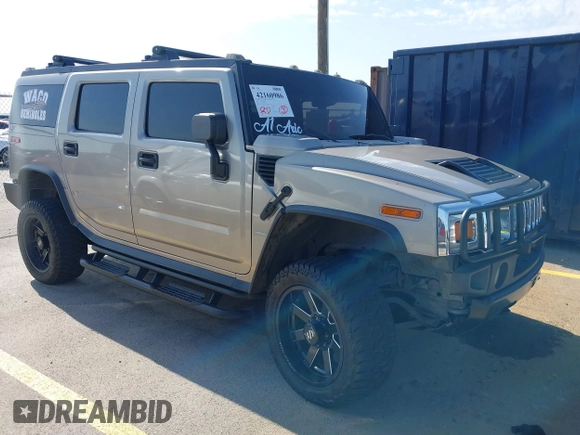 2003 Hummer H2 with VIN 5GRGN23U43H125114, listed as a IAAI auction lot 42160986 with 157,776 mi miles. Bid and sale history available at carsss.com. Image 1.