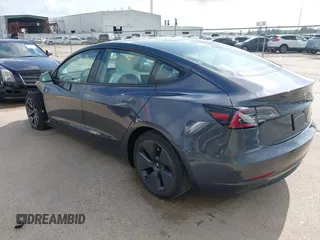 2023 Tesla Model 3 with VIN 5YJ3E1EA7PF567906, listed as a IAAI auction lot 42280993 with 41,452 mi miles and . Bid and sale history available at DreamBid. Image 3.