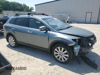2010 Mazda CX-9 Grand Touring with VIN JM3TB2MA2A0221193, listed as a Copart auction lot 62202795 with 252,040 mi miles and Salvage title. Bid and sale history available at DreamBid. Image 4.