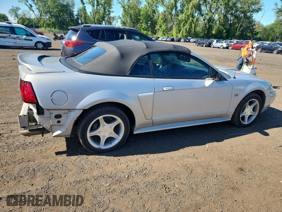 2000 Ford Mustang GT with VIN 1FAFP45X7YF265824, listed as a Copart auction lot 65204825 with 69,117 mi miles and Salvage title. Bid and sale history available at DreamBid. Image 3.