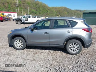 2013 Mazda CX-5 Sport with VIN JM3KE4BE0D0125748, listed as a IAAI auction lot 42143020 with 158,580 mi miles. Bid and sale history available at carsss.com. Image 14.