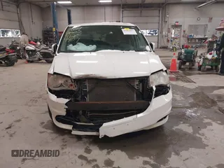 2012 Dodge Grand Caravan SXT with VIN 2C4RDGCG3CR405373, listed as a IAAI auction lot 41264407 with 164,019 mi miles and . Bid and sale history available at DreamBid. Image 13.