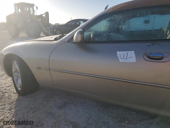 1997 Jaguar XK8 with VIN SAJGX2746VC006441, listed as a Copart auction lot 76823124 with 0 mi miles and Non Repairable. Bid and sale history available at carsss.com. Image 12.