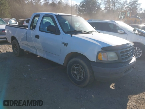 2003 Ford F-150 XL with VIN 1FTRX17W33NA66469, listed as a IAAI auction lot 41677909 with 236,619 mi miles. Bid and sale history available at carsss.com. Image 1.
