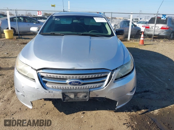 2011 Ford Taurus SE with VIN 1FAHP2DWXBG172965, listed as a IAAI auction lot 41395638 with 147,098 mi miles. Bid and sale history available at carsss.com. Image 6.