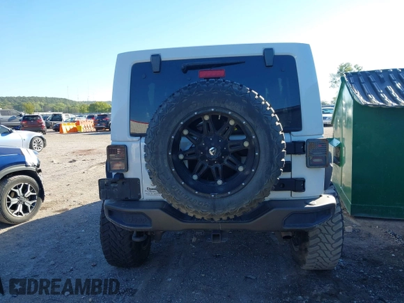 2016 Jeep Wrangler Unlimited Sahara with VIN 1C4BJWEG5GL243004, listed as a IAAI auction lot 40438321 with 121,360 mi miles and . Bid and sale history available at DreamBid. Image 16.