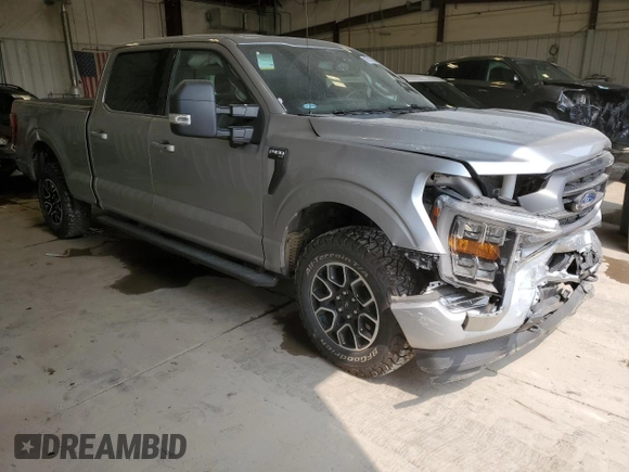 2021 Ford F-150 XL with VIN 1FTFW1E85MKE03933, listed as a Copart auction lot 60513185 with 82,793 mi miles and Salvage title. Bid and sale history available at DreamBid. Image 4.