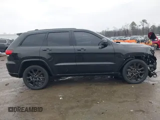 2021 Jeep Grand Cherokee Laredo X with VIN 1C4RJEAG1MC680282, listed as a IAAI auction lot 41466496 with 58,855 mi miles and . Bid and sale history available at DreamBid. Image 13.