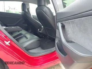 2020 Tesla Model 3 Standard Range Plus z VIN 5YJ3E1EA0LF611657, wystawiony jako IAAI lot #42046234 z przebiegiem 122 557 mil mil oraz . Historia ofert i sprzedaży dostępna na DreamBid. Obrazek 5.