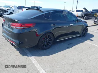 2016 Kia Optima SXL Turbo with VIN 5XXGV4L20GG042682, listed as a IAAI auction lot 41456456 with 117,542 mi miles. Bid and sale history available at carsss.com. Image 4.