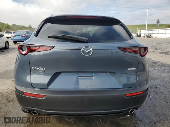 2022 Mazda CX-30 S Carbon Edition z VIN 3MVDMBCLXNM450913, wystawiony jako Copart lot #58537815 z przebiegiem 22 756 mil mil oraz Szkoda całkowita • Salvage title. Historia ofert i sprzedaży dostępna na DreamBid. Obrazek 6.