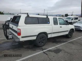 1995 Toyota T100 SR5 with VIN JT4VD12F8S0007489, listed as a Copart auction lot 82177794 with 290,145 mi miles and Clean Title. Bid and sale history available at DreamBid. Image 3.
