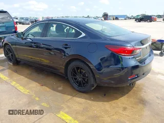 2015 Mazda 6 i Sport with VIN JM1GJ1U52F1201571, listed as a IAAI auction lot 42096344 with 88,290 mi miles and . Bid and sale history available at DreamBid. Image 3.