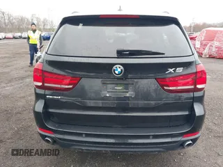 2014 BMW X5 xDrive35i z VIN 5UXKR0C51E0H26528, wystawiony jako IAAI lot #42027626 z przebiegiem 87 228 mil mil oraz . Historia ofert i sprzedaży dostępna na DreamBid. Obrazek 16.