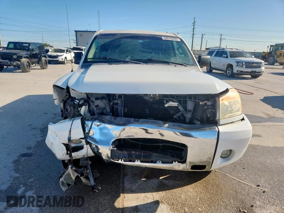 2012 Nissan Titan SV with VIN 1N6BA0ED2CN319597, listed as a Copart auction lot 62016445 with 169,120 mi miles and Salvage title. Bid and sale history available at DreamBid. Image 5.