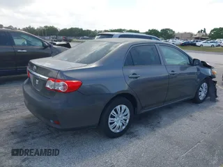 2013 Toyota Corolla L with VIN 5YFBU4EE3DP078437, listed as a IAAI auction lot 42024770 with 102,321 mi miles and . Bid and sale history available at DreamBid. Image 4.