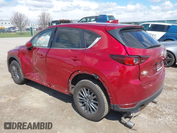 2021 Mazda CX-5 Touring z VIN JM3KFBCM1M0401717, wystawiony jako IAAI lot #42036407 z przebiegiem 35 587 mil mil oraz . Historia ofert i sprzedaży dostępna na DreamBid. Obrazek 3.