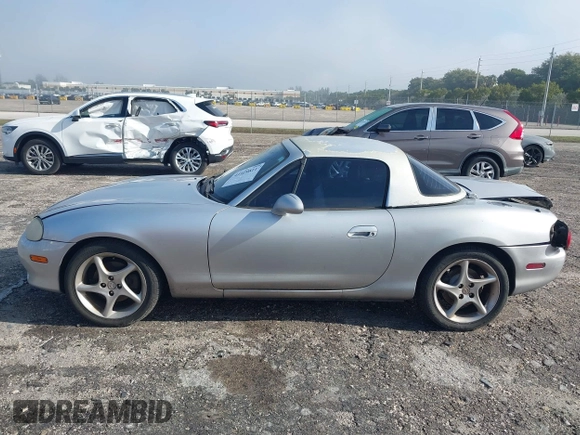 2003 Mazda MX-5 Miata Cloth with VIN JM1NB353730311899, listed as a IAAI auction lot 41929811 with 99,589 mi miles and . Bid and sale history available at DreamBid. Image 14.