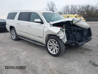 2015 Cadillac Escalade ESV Premium z VIN 1GYS4JKJ1FR214535, wystawiony jako IAAI lot #41701630 z przebiegiem 123 425 mil mil oraz . Historia ofert i sprzedaży dostępna na DreamBid. Obrazek 1.