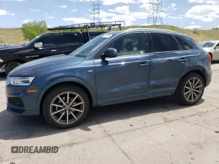 2018 Audi Q3 Premium with VIN WA1BCCFS4JR026621, listed as a Copart auction lot 56717995 with 118,484 mi miles and Salvage title. Bid and sale history available at DreamBid. Image 1.