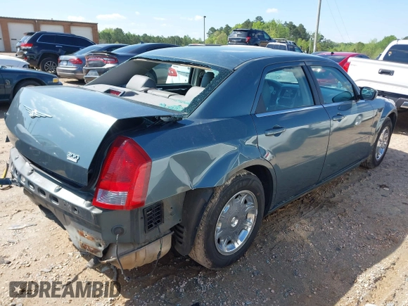2005 Chrysler 300 with VIN 2C3AA53G35H157083, listed as a IAAI auction lot 41945392 with 192,215 mi miles. Bid and sale history available at carsss.com. Image 4.