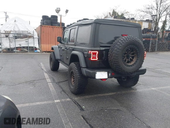 2022 Jeep Wrangler Unlimited Rubicon with VIN 1C4HJXFGXNW127064, listed as a IAAI auction lot 41491203 with 47,700 mi miles and . Bid and sale history available at DreamBid. Image 3.