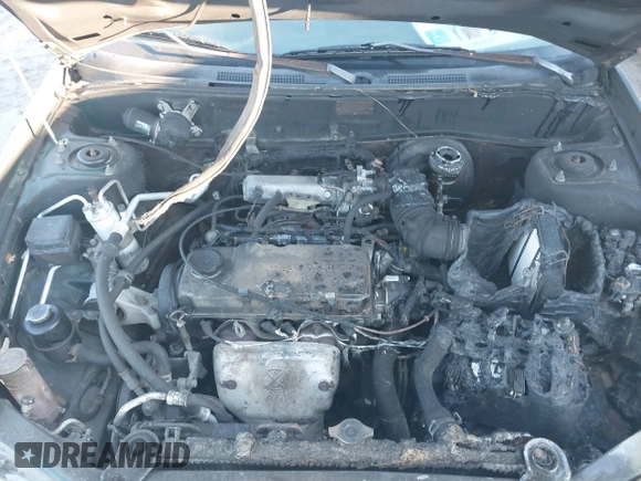 1999 Mitsubishi Mirage DE z VIN JA3AY26A0XU017889, wystawiony jako IAAI lot #40457172 z przebiegiem Nie podano mil oraz . Historia ofert i sprzedaży dostępna na DreamBid. Obrazek 10.