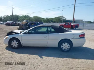 2004 Chrysler Sebring LX z VIN 1C3EL45X14N328051, wystawiony jako IAAI lot #42117822 z przebiegiem 129 535 mil mil oraz . Historia ofert i sprzedaży dostępna na DreamBid. Obrazek 14.