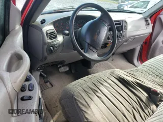 1998 Ford F-150 z VIN 1FTZX17W8WNC34501, wystawiony jako Copart lot #54675995 z przebiegiem 124 628 mil mil oraz Szkoda całkowita • Salvage title. Historia ofert i sprzedaży dostępna na DreamBid. Obrazek 8.