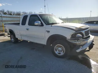 2000 Ford F-150 XL with VIN 1FTRX18W5YKB13685, listed as a Copart auction lot 48286865 with 249,053 mi miles and Salvage Title. Bid and sale history available at carsss.com. Image 4.