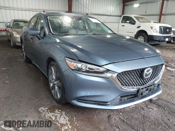 2018 Mazda Mazda6 Touring with VIN JM1GL1VM6J1313332, listed as a IAAI auction lot 41904791 with 71,558 mi miles. Bid and sale history available at carsss.com. Image 1.