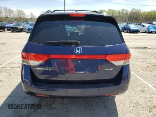 2014 Honda Odyssey Touring with VIN 5FNRL5H96EB068651, listed as a Copart auction lot 51649735 with 157,213 mi miles and Salvage title. Bid and sale history available at DreamBid. Image 6.