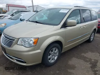 2011 Chrysler Town & Country Touring with VIN 2A4RR5DGXBR666934, listed as a IAAI auction lot 42022807 with 125,920 mi miles and . Bid and sale history available at DreamBid. Image 2.