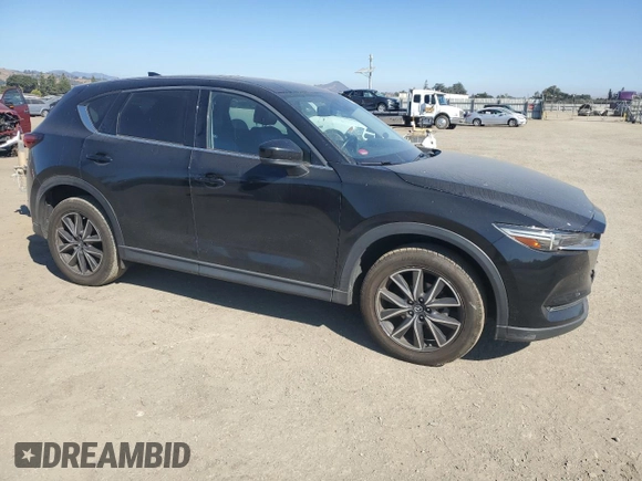 2018 Mazda CX-5 Grand Touring с VIN JM3KFADM2J1310339, выставлен на аукционе Copart как лот 64705245 с пробегом 63 927 миль миль и Списание • Salvage title. История ставок и продаж доступна на DreamBid. Изображение 4.