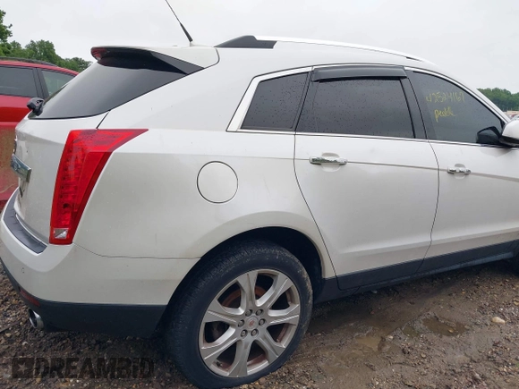 2010 Cadillac SRX Premium Collection z VIN 3GYFNCEY4AS569787, wystawiony jako IAAI lot #42524167 z przebiegiem 222 000 mil mil oraz . Historia ofert i sprzedaży dostępna na DreamBid. Obrazek 13.