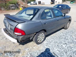 2001 Nissan Sentra GXE z VIN 3N1CB51D11L525002, wystawiony jako IAAI lot #41888310 z przebiegiem 119 547 mil mil oraz . Historia ofert i sprzedaży dostępna na DreamBid. Obrazek 4.