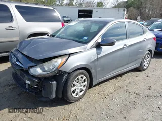 2014 Hyundai Accent GLS with VIN KMHCT4AEXEU710606, listed as a IAAI auction lot 41764163 with 103,859 mi miles. Bid and sale history available at carsss.com. Image 2.